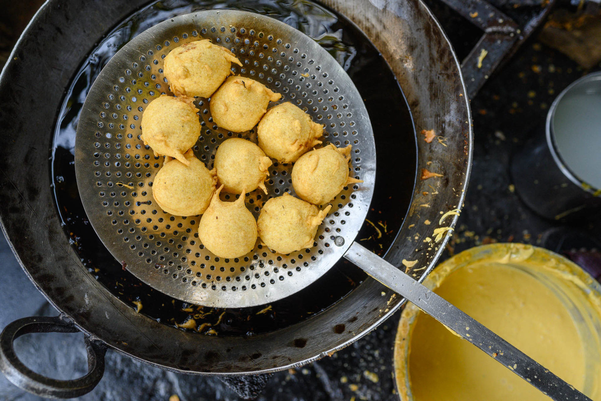 A fresh batch of Vadas being fried on the street near the Bombay High Court